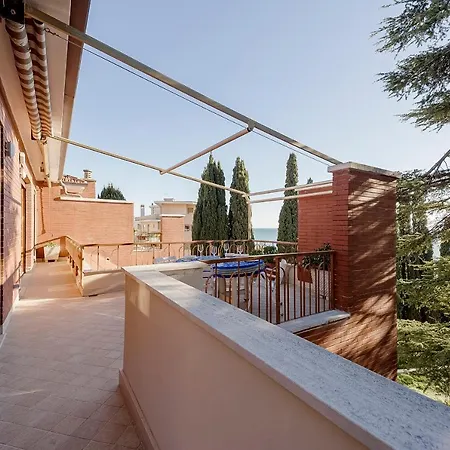 Guesthost - Portosole Attic - With Terrace And Private Parking *